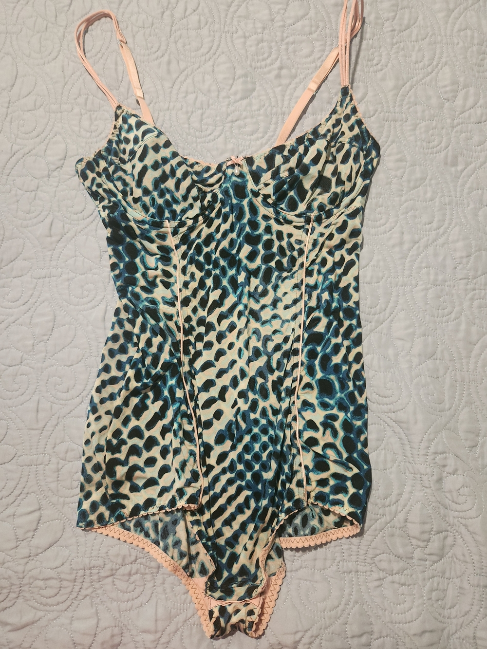 Cosmopolitan Leopard Print Bodysuit with Pink Trim